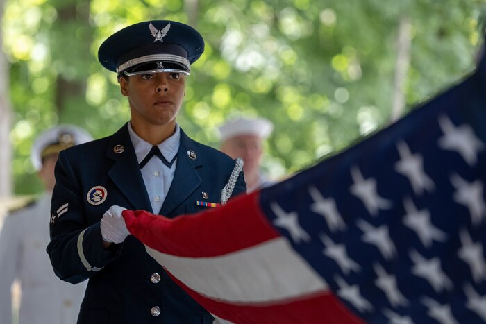 Woman holds flag