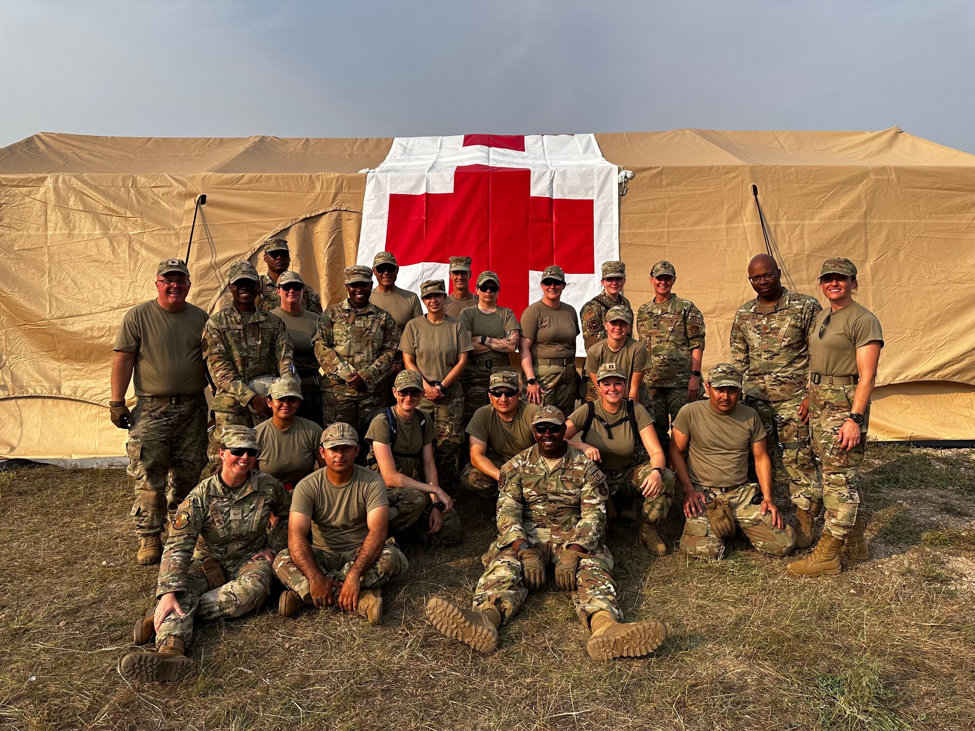 Members of the 433rd Aeromedical Staging Squadron and the 914th Aeromedical Staging Squadron outside their training area at Fort McCoy, Wisconsin during Patriot Medic 23.
