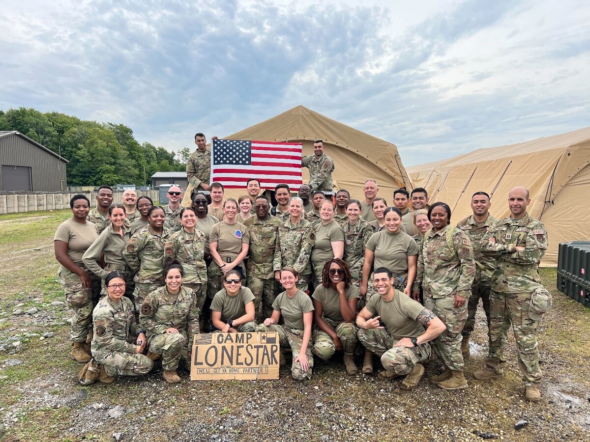 Reserve Citizen Airmen of the 433rd Medical Squadron pose for a photo outside their training area at Youngstown Air Reserve Base, Ohio during Patriot Medic 23.
