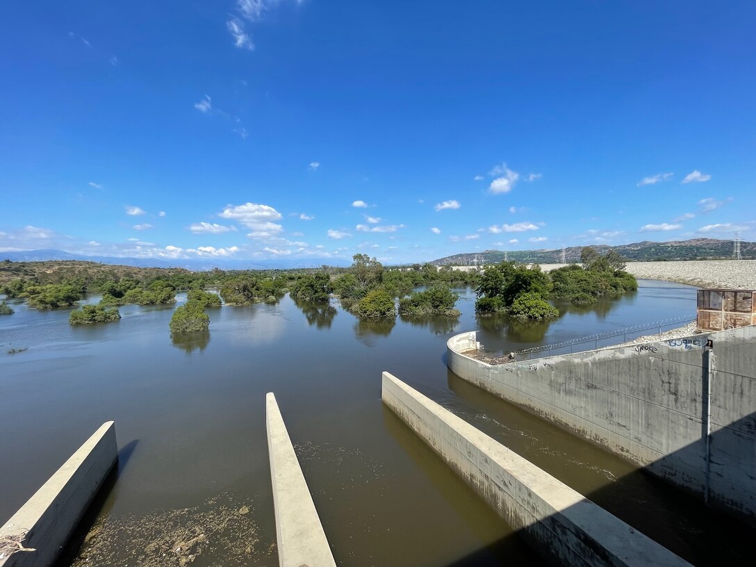 High water remains in the basin Aug. 21 at Whittier Narrows Dam in Pico Rivera, California, the day after Tropical Storm Hilary made landfall. Although the primary purpose of this and other Corps dams is flood-risk management, about 75 percent of stormwater runoff — an estimated 7,000 acre-feet, valued at $7 million — passed through Whittier Narrows Dam and was captured downstream for groundwater recharge by the Los Angeles County Public Works.