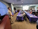 Potential new civilian hires are welcomed to Walter Reed by its director of resource management and other leadership at the medical center during its first Rapid Clearing Event on Aug. 31, held to streamline the onboarding process for new civilian employees.