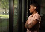Former U.S. Marine Stephanie Bowens, a cancer survivor and nursing administrator, contemplates her day at Walter Reed, preparing for an upcoming breast reconstruction surgery.