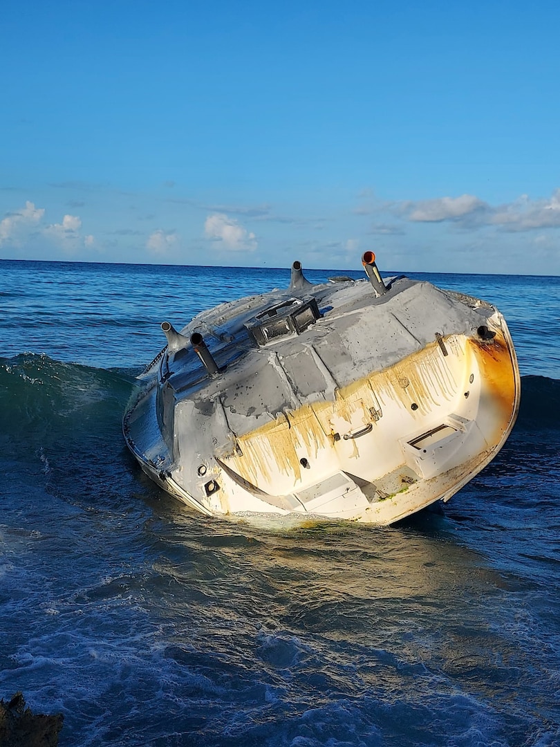 A derelict vessel lays aground on Mona Island, Puerto Rico Sept. 2, 2023, during Coast Guard response efforts to remove the pollution threat impacting the natural reserve.  Resolve Marine cleanup crews, hired as the oil spill response organization for this case, completed the removal of 300 gallons of diesel, oily water waste and two cubic yards of oiled debris from the vessel’s tanks and interior Sept. 5, 2023.  (U.S. Coast Guard photo)