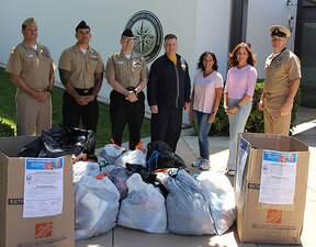Leadership from Information Warfare Training Command (IWTC) San Diego gathered to deliver the donations that had been gathered by their command throughout the month to My Girlfriend’s Closet coordinators. IWTC San Diego, as part of the Center for Information Warfare Training (CIWT), provides a continuum of training to Navy and joint service personnel at sites across the Pacific that prepares them to conduct information warfare across the full spectrum of military operations.