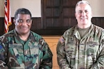 Second Lt. (Va.) James Thompson, a VDF chaplain, and Maj. Dan Finley, the command chaplain for the Fort Barfoot-based 134th Chaplain Support Team, pose for a photo after Thompson led a chapel service Aug. 27, 2023, at Fort Barfoot’s Bulla Chapel. (U.S. Army National Guard photo by Staff Sgt. Jeff Clements)