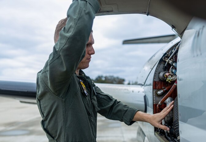 U.S. Marine Corps Staff Sgt. Marc Mihailovic, a radar technician with Headquarters and Headquarters Squadron, Marine Corps Air Station Camp Pendleton, inspects a UC-12W aircraft during a preflight inspection at MCAS Camp Pendleton Aug. 21, 2023. Mihailovic a Sacramento, California native, was awarded the San Diego Military Advisory Council Achievement Award for his outstanding performance while serving as staff non-commissioned officer in charge of Marine Transport Squadron detachment and as a UC-12W Transport Aircrewman Naval Air Training and Operations Procedures Standardization instructor.