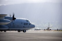 A KC-130J Hercules assigned to Marine Aerial Refueler Transport Squadron 153 (VMGR-153), Marine Aircraft Group 24, 1st Marine Aircraft Wing, departs from Marine Corps Air Station Kaneohe Bay, Marine Corps Base Hawaii, Aug. 22, 2023. At the request of Joint Task Force 50, and in accordance with U.S. federal law, Hawaii based U.S. Marines with VMGR-153 provided inter-island transportation of personnel and equipment from Oahu to Maui. (U.S. Marine Corps photo by Lance Cpl. Logan Beeney)
