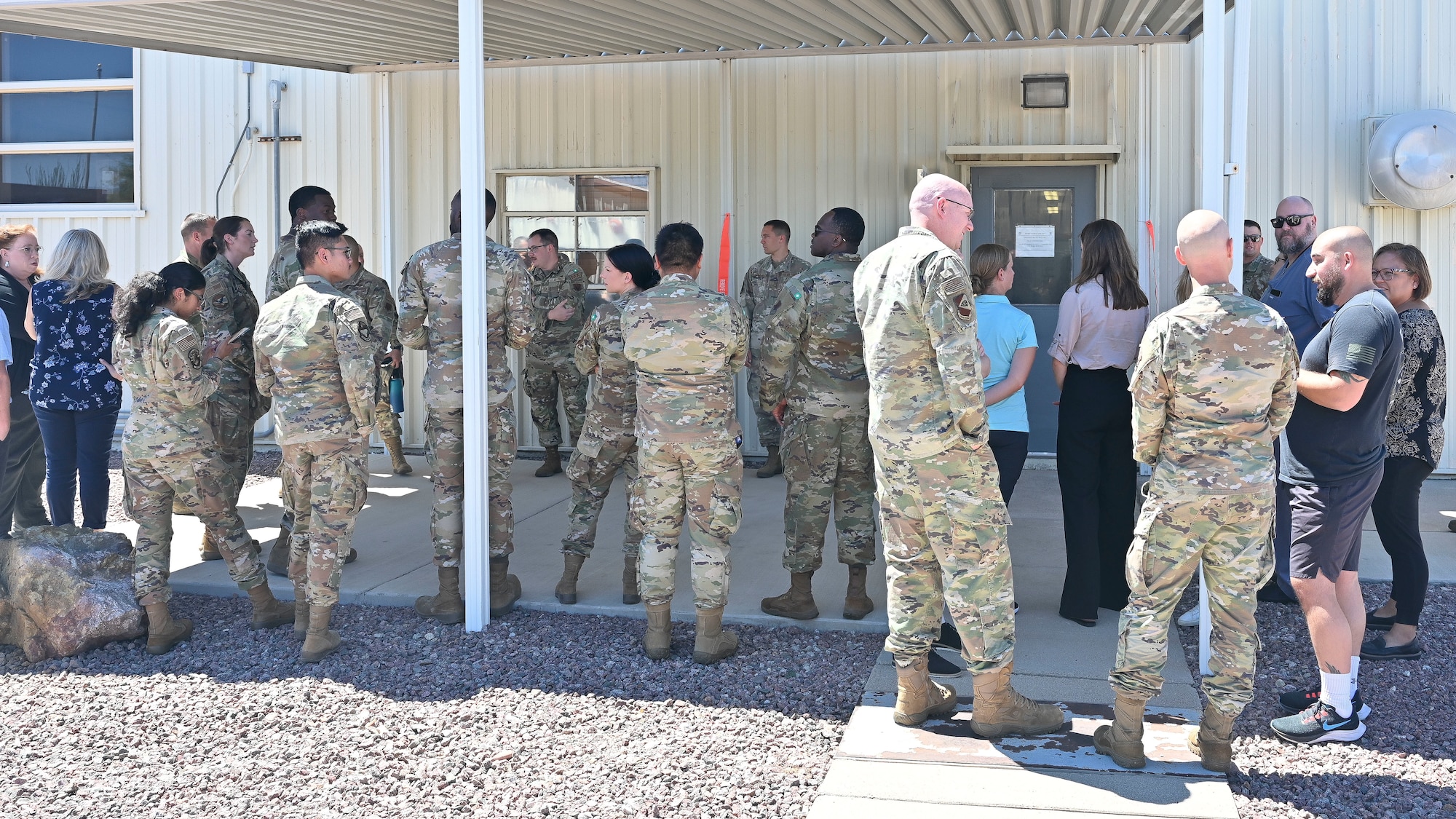 Pictured above is a group of people waiting.