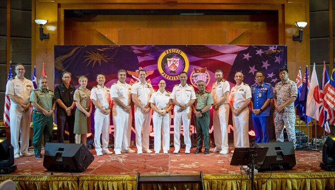 Pacific Partnership 2023 and Malaysian Armed Forces leadership pose for a photo.