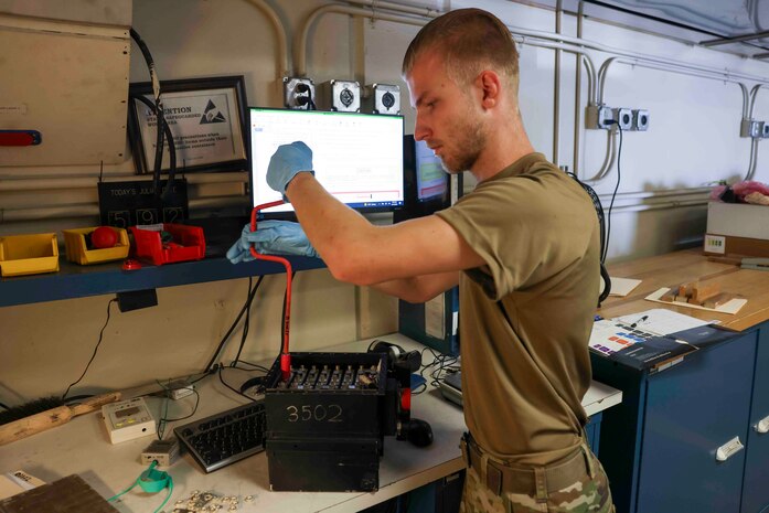 U.S. Air Force Senior Airman Maxwell Karline, 9th Maintenance Squadron electrical and environmental systems craftsmen disassembles of a battery used on the U-2 Dragon Lady, and the T-38 Talon, Aug. 11, 2023 at Beale Air Force Base, California.