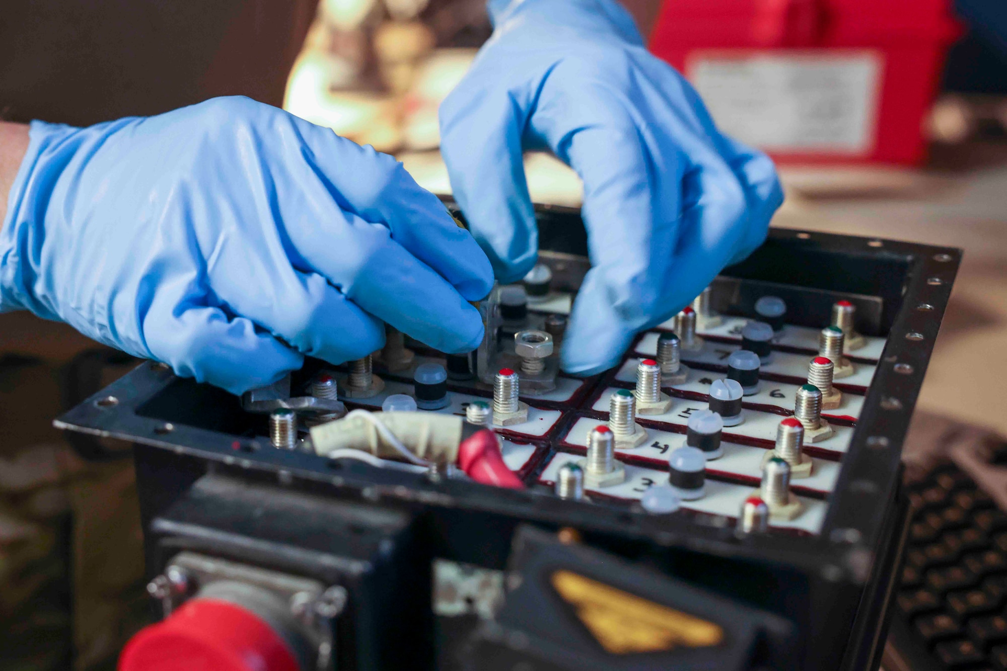 U.S. Air Force Senior Airman Maxwell Karline, 9th Maintenance Squadron electrical and environmental systems craftsmen, removes hardware for disassembly of a battery used on the U-2 Dragon Lady, and the T-38 Talon, Aug. 11, 2023, at Beale Air Force Base, California.