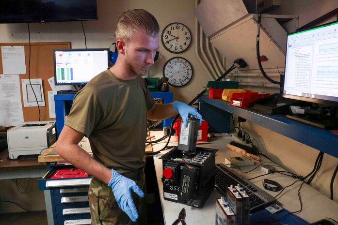 U.S. Air Force Senior Airman Maxwell Karline, 9th Maintenance Squadron electrical and environmental systems craftsmen, removes cells from a battery case used on the U-2 Dragon Lady, and the T-38 Talon, Aug. 11, 2023, at Beale Air Force Base, California.