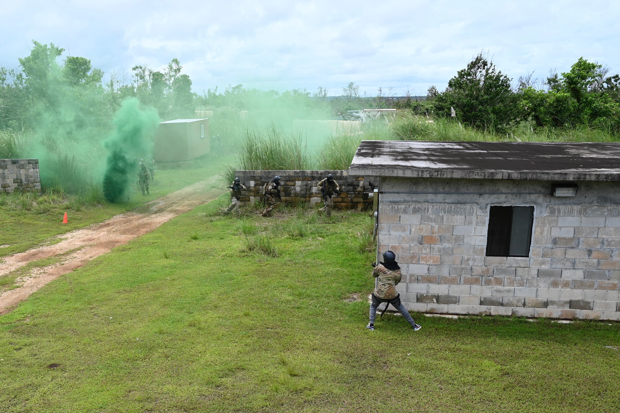Airmen engage in simulated armed combat.