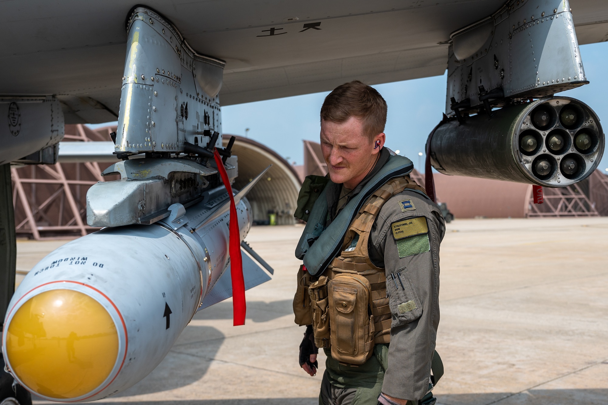 U.S. Air Force Capt. Jacob Stafford, 25th Fighter Squadron pilot, conducts preflight checks before a routine training mission at Osan Air Base, Republic of Korea, Aug. 31, 2023. Preflight checks ensure aircraft are properly configured and adequately prepared to execute the mission of the 51st Fighter Wing. (U.S. Air Force photo by Staff Sgt. Thomas Sjoberg)
