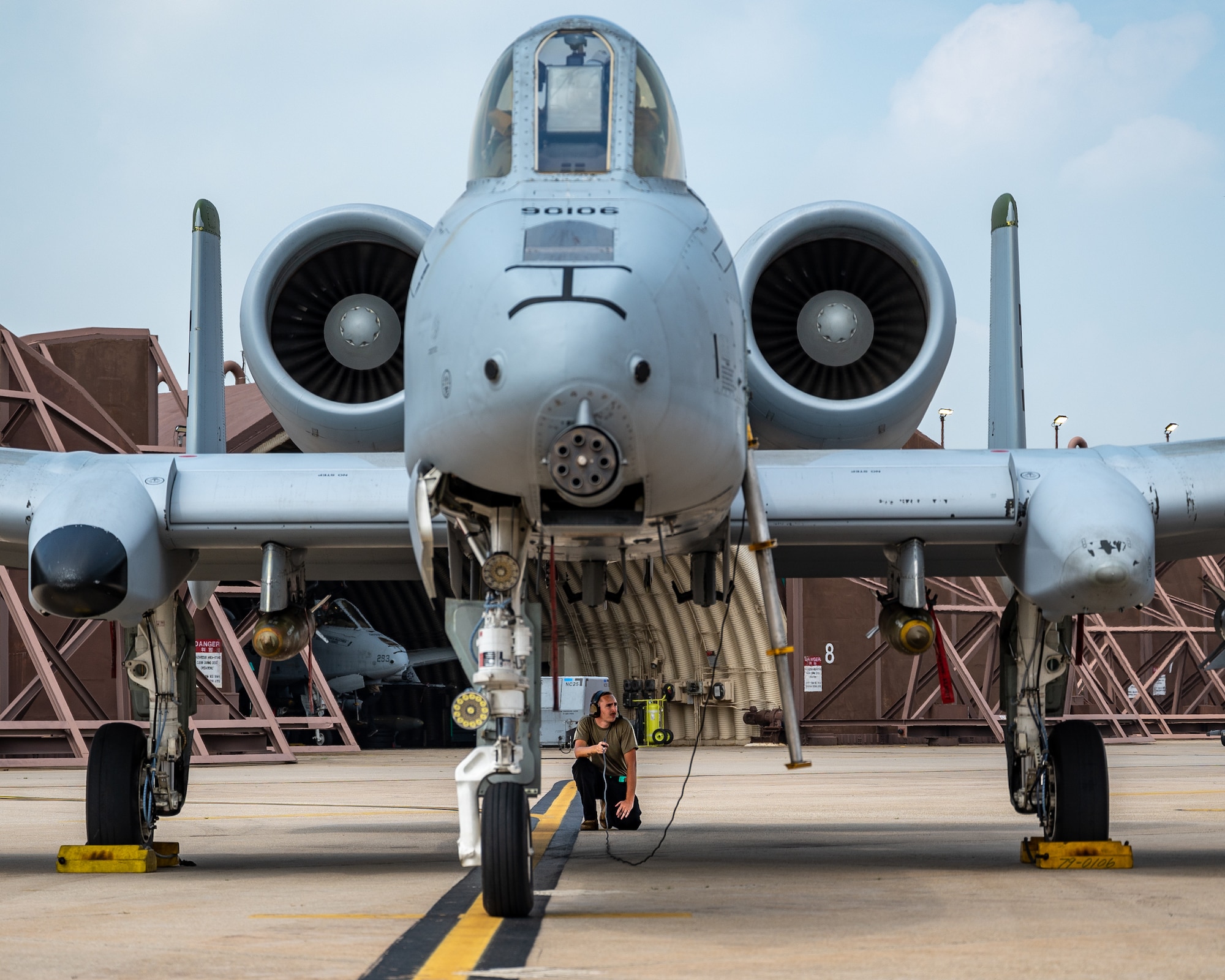 U.S. Air Force Airman 1st Class Matthew Ledbeter, 25th Fighter Generation Squadron crew chief, conducts preflight checks with Capt. Jacob Stafford, 25th Fighter Squadron pilot, on an A-10C Thunderbolt II at Osan Air Base, Republic of Korea, Aug. 31, 2023. The 25th FGS Crew chiefs are responsible for aircraft maintenance, inspection, and readiness, ensuring that 25th FS aircraft are in proper working order and always ready to fight tonight. (U.S. Air Force photo by Staff Sgt. Thomas Sjoberg)