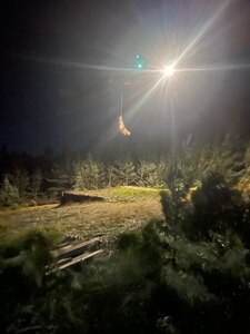 Tennessee National Guard crew chief, Staff Sgt. Joseph Hough, lowers the flight paramedic, Sgt. 1st Class Giovanni DeZuani, to a clearing near a sick hiker during a rescue at the Great Smoky Mountains National Park, September 2.