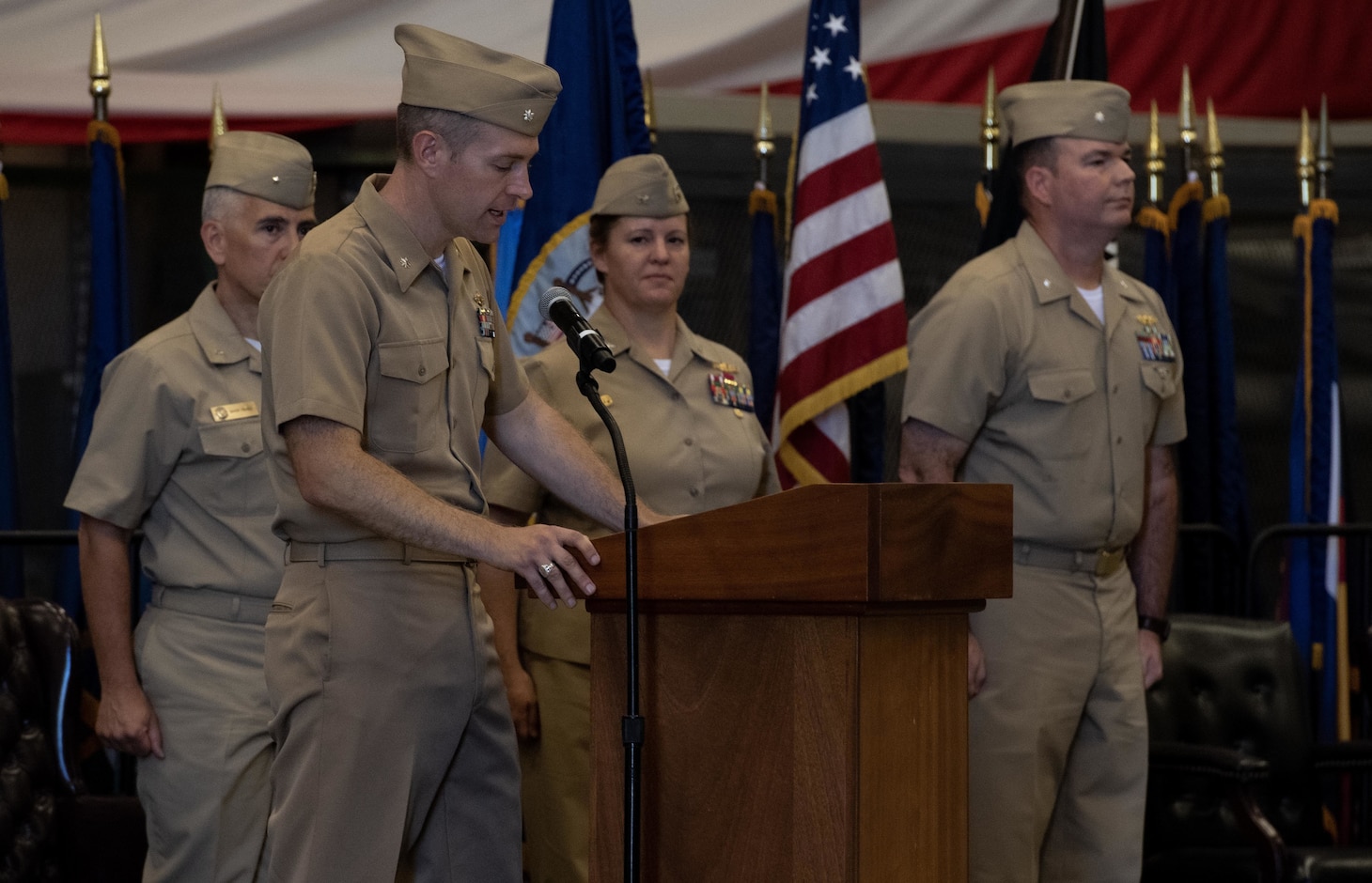 230906-N-DH811-1091 Virginia Beach, Va. (Sept. 6, 2023)— Cmdr. Brian Lucas, a Reserve surface warfare officer, departs his assumption of command ceremony, Sept. 6, onboard Joint Expeditionary Base Little Creek-Fort Story. Navy Expeditionary Combat Command’s Maritime Expeditionary Security Force deploys globally and operates throughout the sea-to-shore and inland operating environment, protecting maritime infrastructure, providing insertion and extraction capabilities and supporting assets enabling maritime operations. (U.S. Navy photo by Mass Communication Specialist 1st Class Benjamin T. Liston)