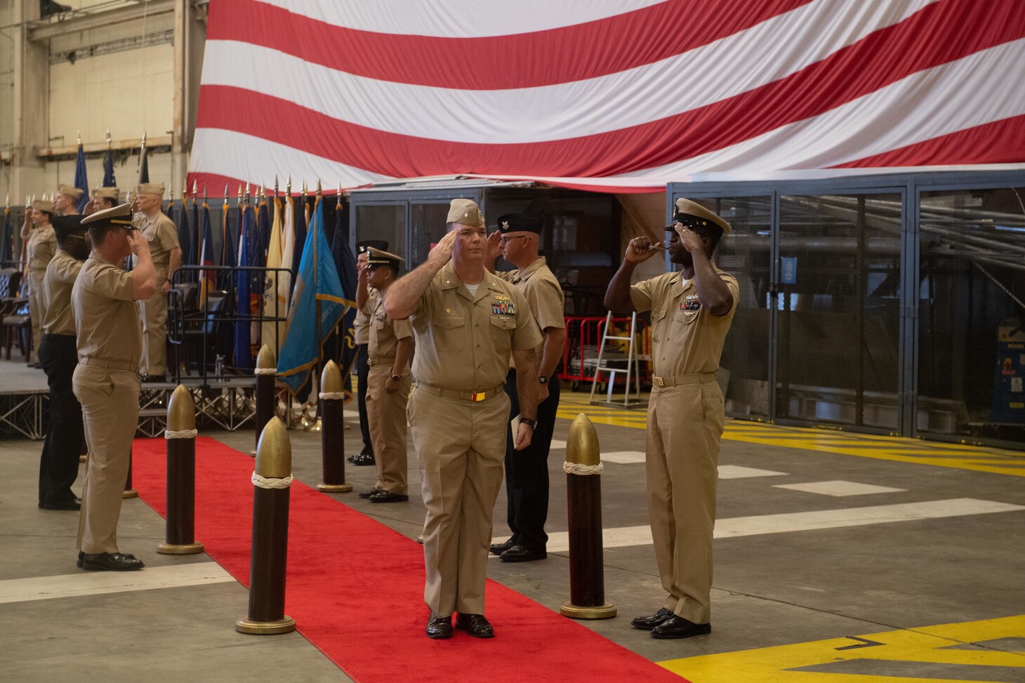 230906-N-DH811-1091 Virginia Beach, Va. (Sept. 6, 2023)— Cmdr. Brian Lucas, a Reserve surface warfare officer, departs his assumption of command ceremony, Sept. 6, onboard Joint Expeditionary Base Little Creek-Fort Story. Navy Expeditionary Combat Command’s Maritime Expeditionary Security Force deploys globally and operates throughout the sea-to-shore and inland operating environment, protecting maritime infrastructure, providing insertion and extraction capabilities and supporting assets enabling maritime operations. (U.S. Navy photo by Mass Communication Specialist 1st Class Benjamin T. Liston)