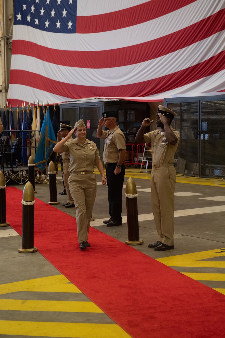 230906-N-DH811-1091 Virginia Beach, Va. (Sept. 6, 2023)— Cmdr. Brian Lucas, a Reserve surface warfare officer, departs his assumption of command ceremony, Sept. 6, onboard Joint Expeditionary Base Little Creek-Fort Story. Navy Expeditionary Combat Command’s Maritime Expeditionary Security Force deploys globally and operates throughout the sea-to-shore and inland operating environment, protecting maritime infrastructure, providing insertion and extraction capabilities and supporting assets enabling maritime operations. (U.S. Navy photo by Mass Communication Specialist 1st Class Benjamin T. Liston)