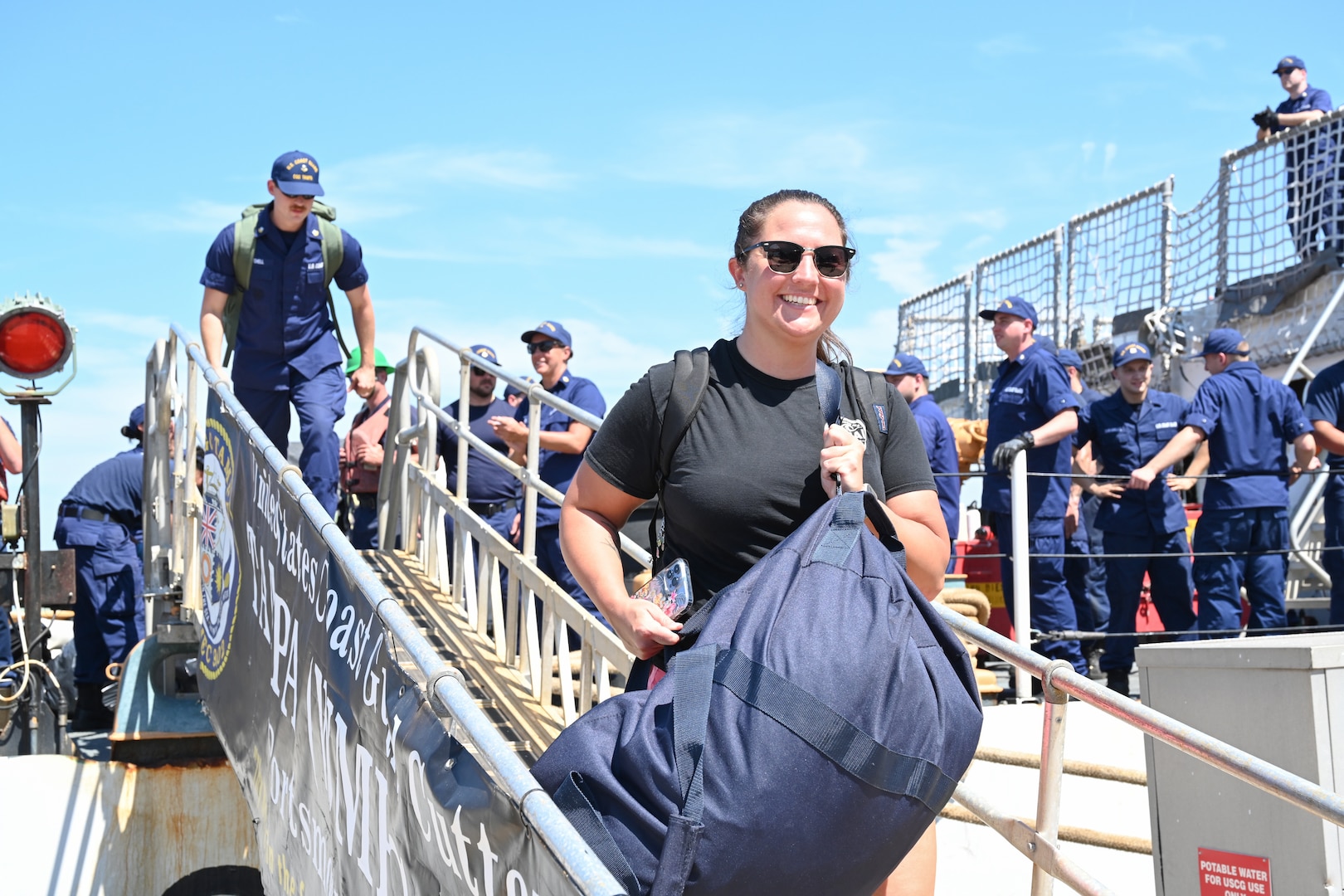 Crew members of the U.S. Coast Guard Cutter Tampa (WMEC 902) disembark at the pier, Sept. 5, 2023, in Portsmouth, Virginia following a 67-day patrol in the Florida Straits and Windward Passage. Tampa deployed in support of Homeland Security Task Force — Southeast and conducted maritime safety and security missions. (U.S. Coast Guard photo by Petty Officer 2nd Class Brandon Hillard)