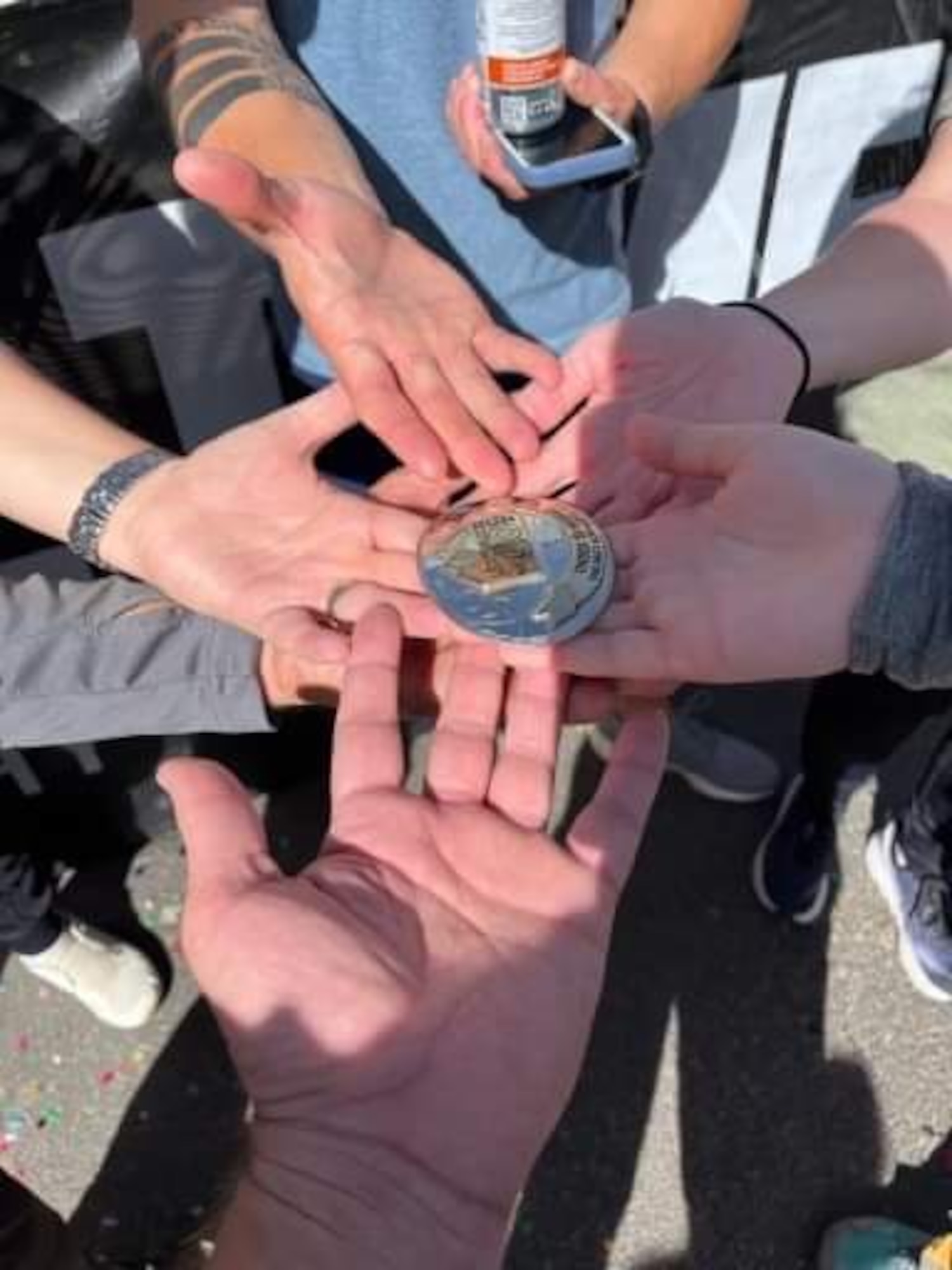 Patrick Buzzard, 4th Test and Evaluation Squadron security manager, and his crew and pacers hold the Leadville Trail 100 Run belt buckle after completing the 100-mile run near Leadville, Colorado, Aug. 20, 2023. The dedication, love and support of a runner’s crew and pacers were critical to Buzzard’s successful completion of the race. The Leadville Trail 100 Run is an ultramarathon held annually on rugged trails and dirt roads through the heart of the Rocky Mountains. The course is a 50-mile out-and-back dogleg run primarily on the Colorado Trail, starting at 10,200 feet. The centerpiece of the course is the climb up to Hope Pass at 12,620 feet, encountered on both the outbound trek and on the return. Buzzard finished the 100-mile course in 29 hours, 48 minutes, and 57 seconds, just beating the 30-hour time limit. (Courtesy photo)