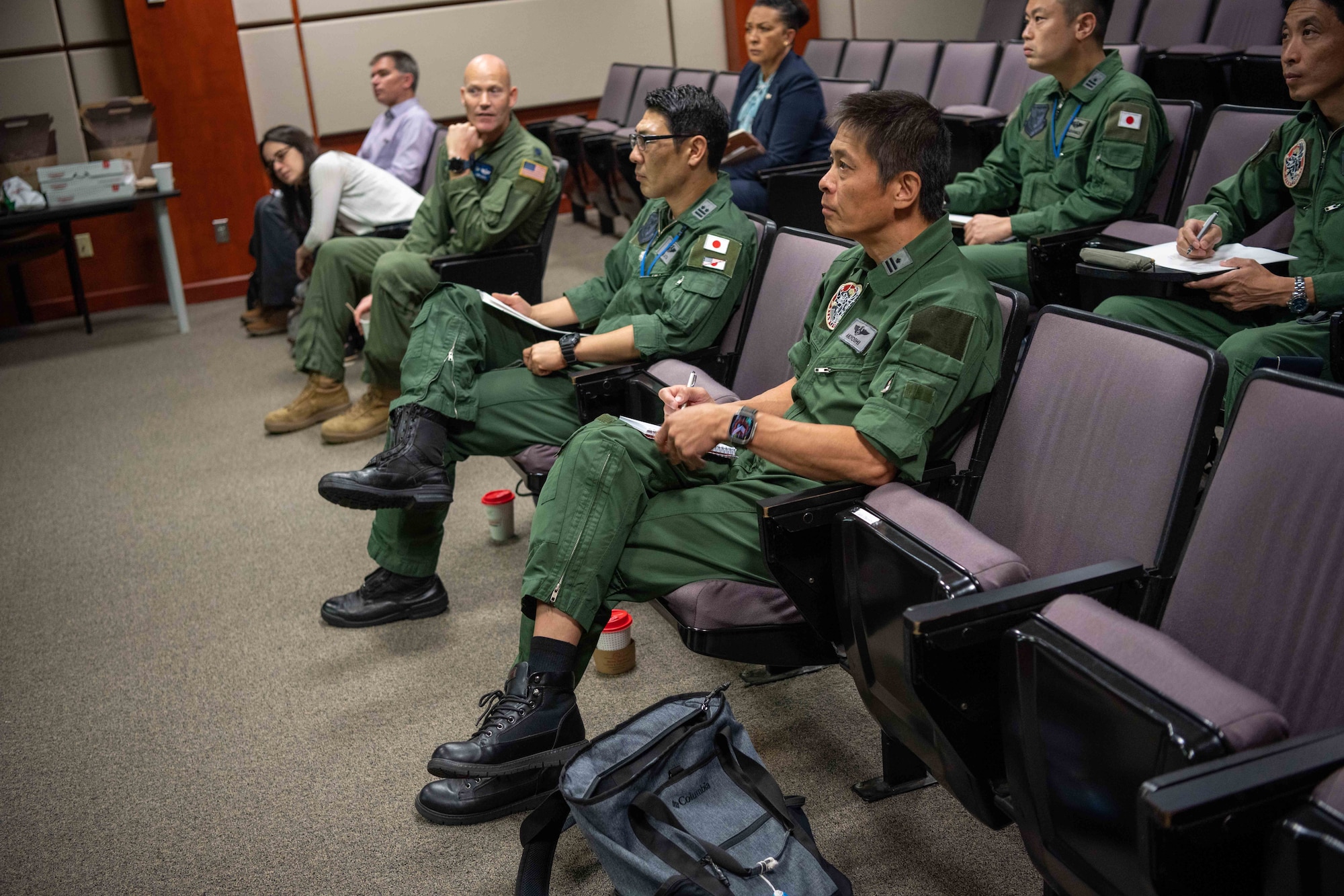 Members from the 405th Air Refueling Squadron, Japan Air Self-Defense, discuss KC-46A Pegasus operations Aug. 29, 2023, at McConnell Air Force Base, Kansas. McConnell Airmen informed the JSDAF members how to effectively operate the KC-46 during their three-day tour of the base. (U.S. Air Force photo by Airman 1st Class William Lunn)