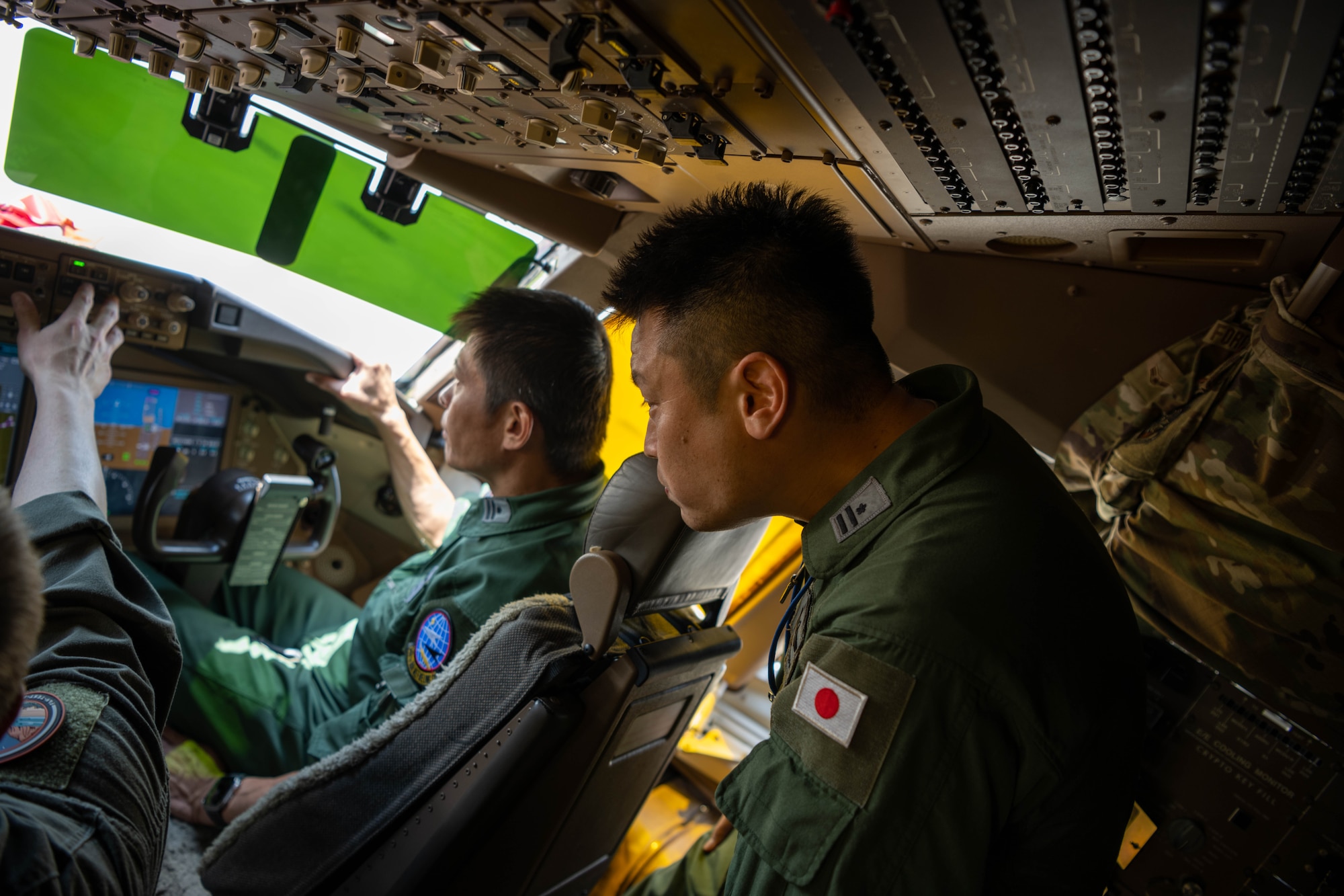 Members of the 405th Air Refueling Squadron, Japan Air Self-Defense Force, tour a KC-46A Pegasus Aug. 29, 2023, at McConnell Air Force Base, Kansas. McConnell Airmen informed the JSDAF members how to effectively operate a KC-46 during their three-day tour of the base. (U.S. Air Force photo by Airman 1st Class William Lunn)