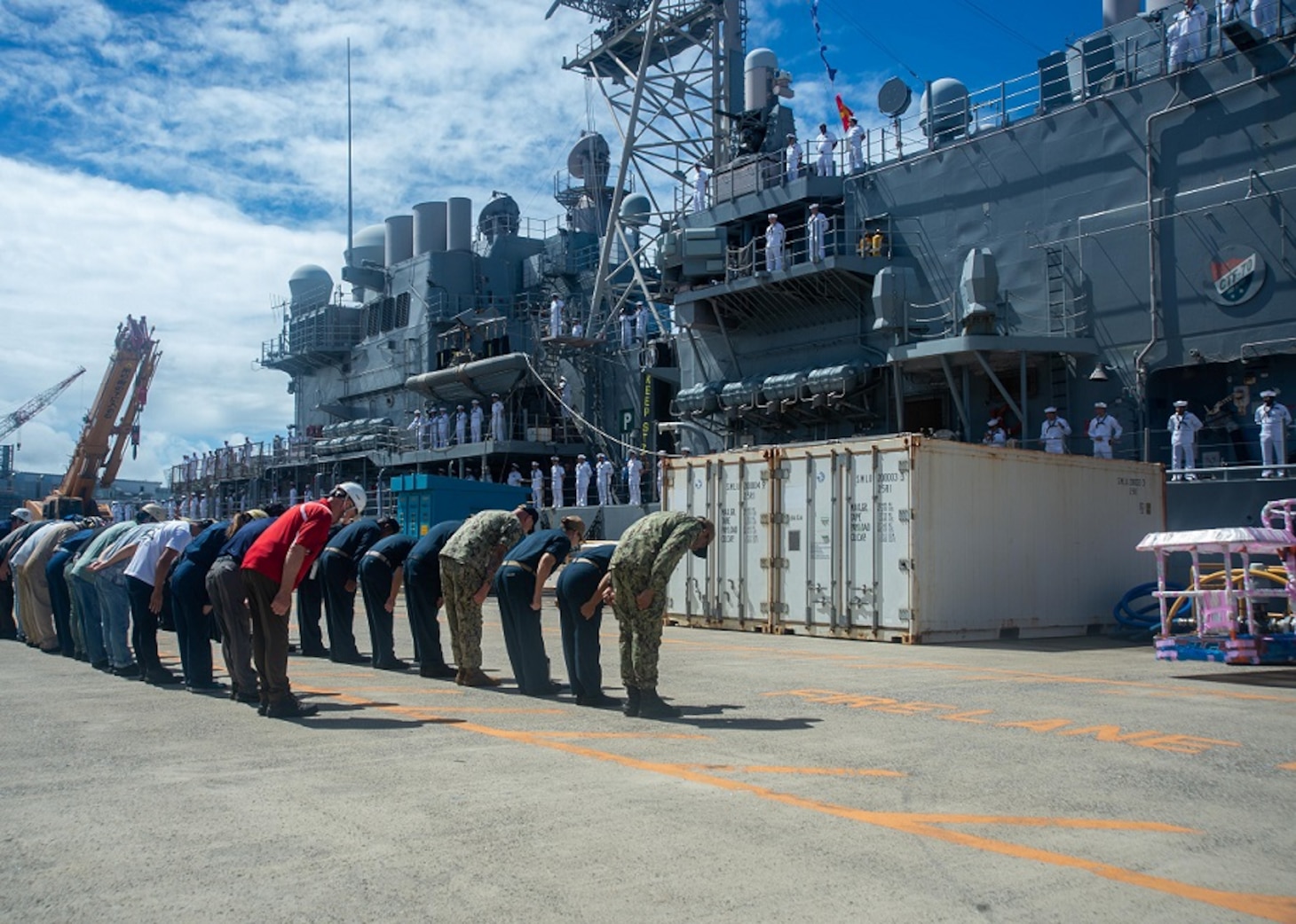 U.S. Navy Sailors and members of Ship Repair Facility (SRF) Yokosuka bow to the Ticonderoga-class guided-missile cruiser USS Shiloh (CG 67) in Yokosuka, Japan, Sept. 5, 2023. Shiloh departed Yokosuka on Sept. 5 to transit to its new homeport of Pearl Harbor, Hawaii, as part of a planned rotation of forces in the Pacific. Shiloh is attached to Commander, Carrier Strike Group 5 forward-deployed to the U.S. 7th Fleet area of operations in support of a free and open Indo Pacific. (U.S. Navy photo by Mass Communication Specialist 2nd Class Askia Collins)