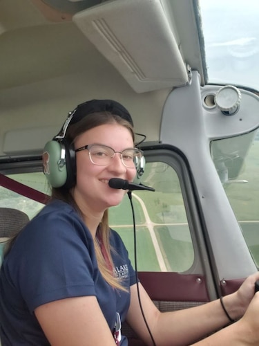 Air Force Junior ROTC Cadet Paris Thompson takes the stick during a flight over Iowa on July 20, 2023. Thompson, a student at Hamilton High School, Chandler, Ariz., was one of the cadets taking part in the Air Force JROTC Flight Academy private pilot certificate program at Iowa Lakes Community College, Estherville, Iowa, over the summer. Started in 2017, with the first cadets buckling into cockpits in summer 2018, the eight-week program was launched as part of the Air Force Aircrew Task Force, formed in part to restore the nation’s youths’ interest in aviation careers and to increase diversity in aircrews, both military and civilian. (Courtesy photo)