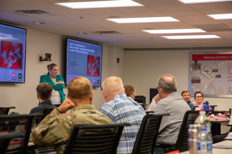 Angel Lipton, U.S. Army Corps of Engineers, Omaha District training manager, and new district employees listen during around-the-room introductions at New Employee Orientation, August 23, 2023 at the headquarters building in Omaha, Nebraska. (U.S. Army photo by Sarah Rich)