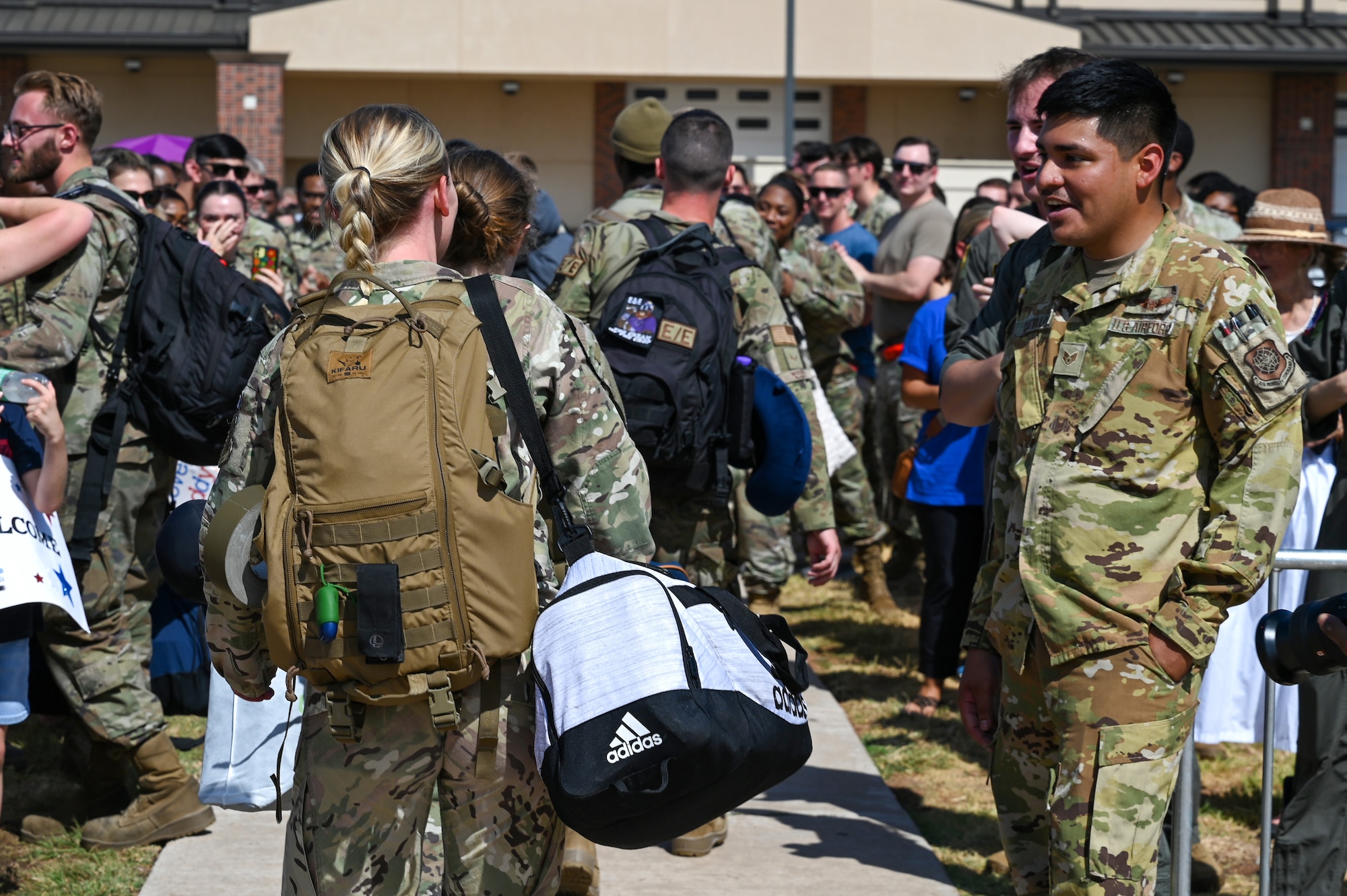 Airmen assigned to the 317th Airlift Wing greet returnees.