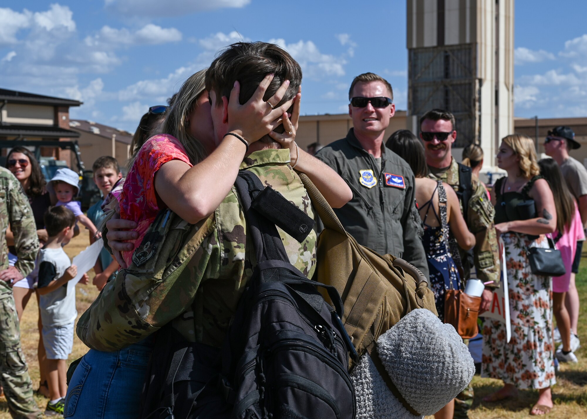 An Airman assigned to the 317th Airlift Wing embraces a loved one.