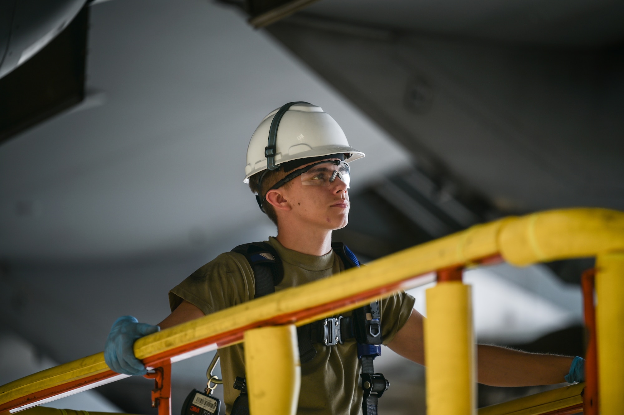 Airman 1st Class Jacob Pippin, 15th Maintenance Squadron crew chief, inspects C-17 Globemaster III flap joints during a home station check at Joint Base Pearl Harbor-Hickam, Hawaii, Aug. 7, 2023. A home station check is a mandatory 180-day service that maintainers perform to increase the longevity of a C-17. (U.S. Air Force photo by Staff Sgt. Alan Ricker)
