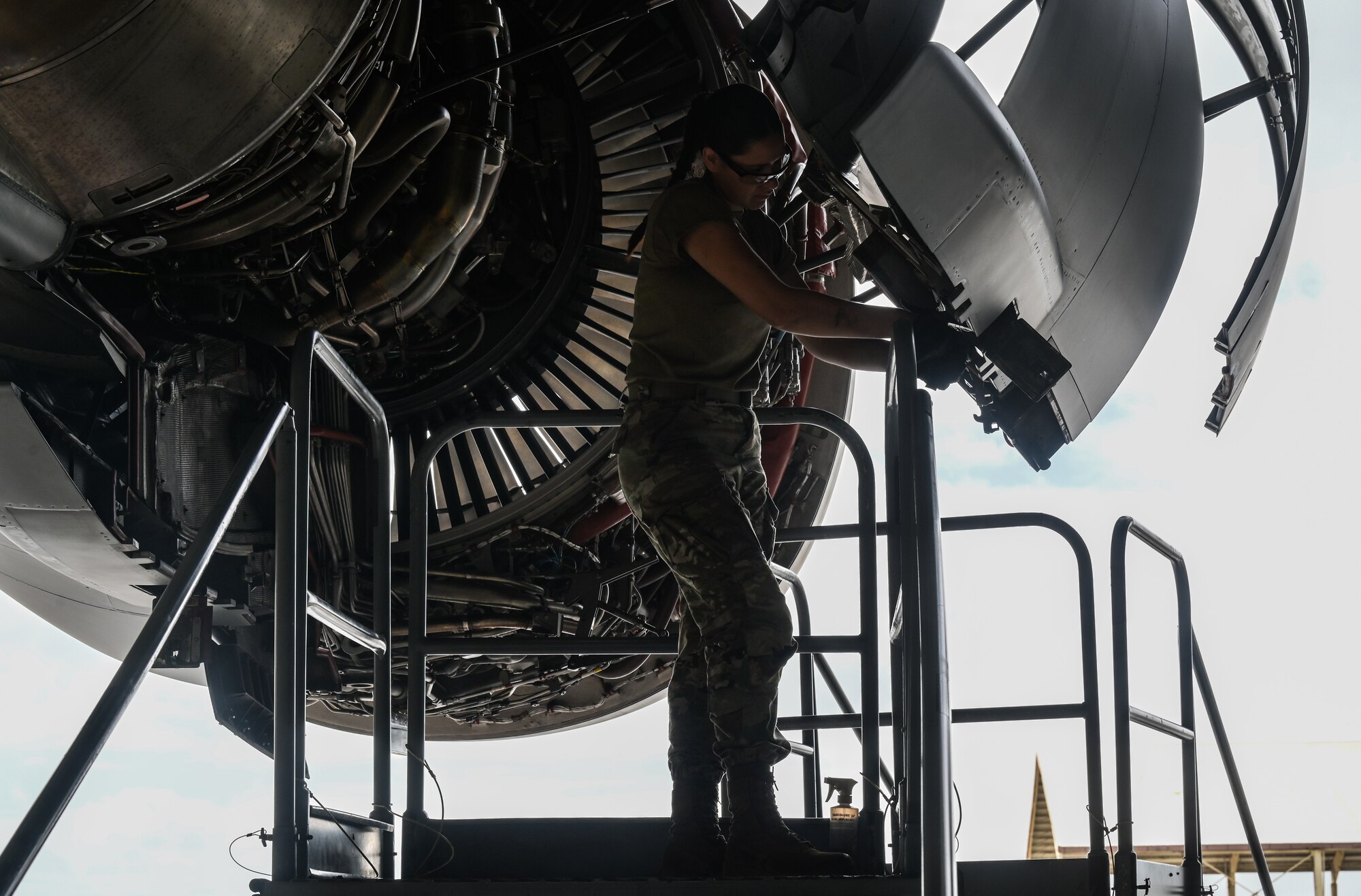 Airman 1st Class Hazel Stelmaszczyk Luna, 15th Maintenance Squadron aerospace propulsion journeyman, inspects a C-17 Globemaster III engine during a home station check at Joint Base Pearl Harbor-Hickam, Hawaii, Aug. 7, 2023. Each C-17 undergoes a mandatory home station check every 180 days, allowing several maintenance shops to inspect the entire airframe and prolong its operational condition. (U.S. Air Force photo by Staff Sgt. Alan Ricker)