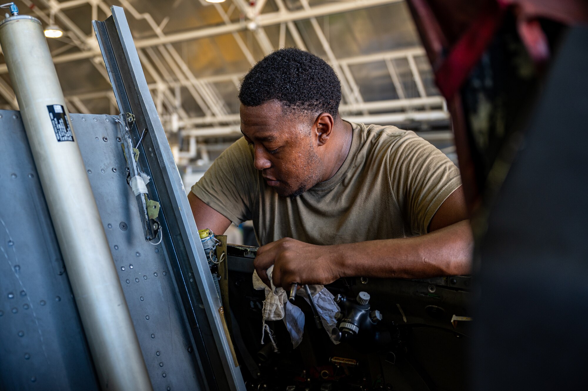 U.S. Air Force Senior Airman John Johnson, 36th Fighter Generation Squadron advanced avionics technician, conducts routine maintenance on an F-16 Fighting Falcon at Osan Air Base, Republic of Korea, Sep. 6, 2023. Maintaining the F-16 avionics significantly enhances the 36th Fighter Squadron’s ability to maintain air superiority, respond effectively to a wide range of mission requirements and contribute to maintaining stability in the Indo-Pacific region. (U.S. Air Force photo by Staff Sgt. Thomas Sjoberg)