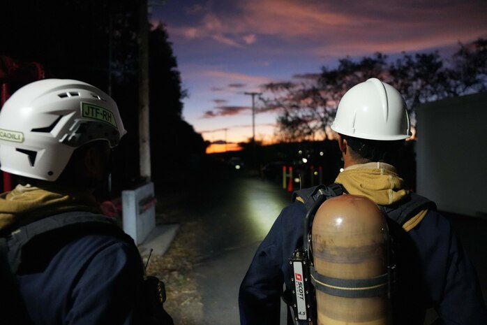 Joint Task Force-Red Hill (JTF-RH) roving security and fire watch team members exit the Red Hill Bulk Fuel Storage Facility (RHBFSF), Halawa, Hawaii, Sep. 6, 2023. JTF-RH roving security and fire watch teams began 24-hour surveillance of the RHBFSF during fuel line repacking operations last month and will continue through completion of gravity defueling. (DoD photo by U.S. Air National Guard Tech. Sgt. Nicholas Brown)