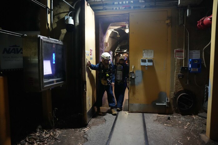 Joint Task Force-Red Hill (JTF-RH) roving security and fire watch team members enter the Red Hill Bulk Fuel Storage Facility (RHBFSF), Halawa, Hawaii, Sep. 6, 2023. JTF-RH roving security and fire watch teams began 24-hour surveillance of the RHBFSF during fuel line repacking operations last month and will continue through completion of gravity defueling. (DoD photo by U.S. Air National Guard Tech. Sgt. Nicholas Brown)