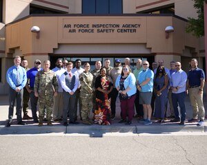 Members of the Allied Ammunition Storage and Transport Publication course pose for a group photo in front of the Air Force Safety Center at Kirtland Air Force Base, August 31, 2023. The course teaches a common set of explosives safety criteria to ensure a minimum NATO-tolerable level of risk is achieved. (U.S. Air Force Photo by Ashley Palacios)