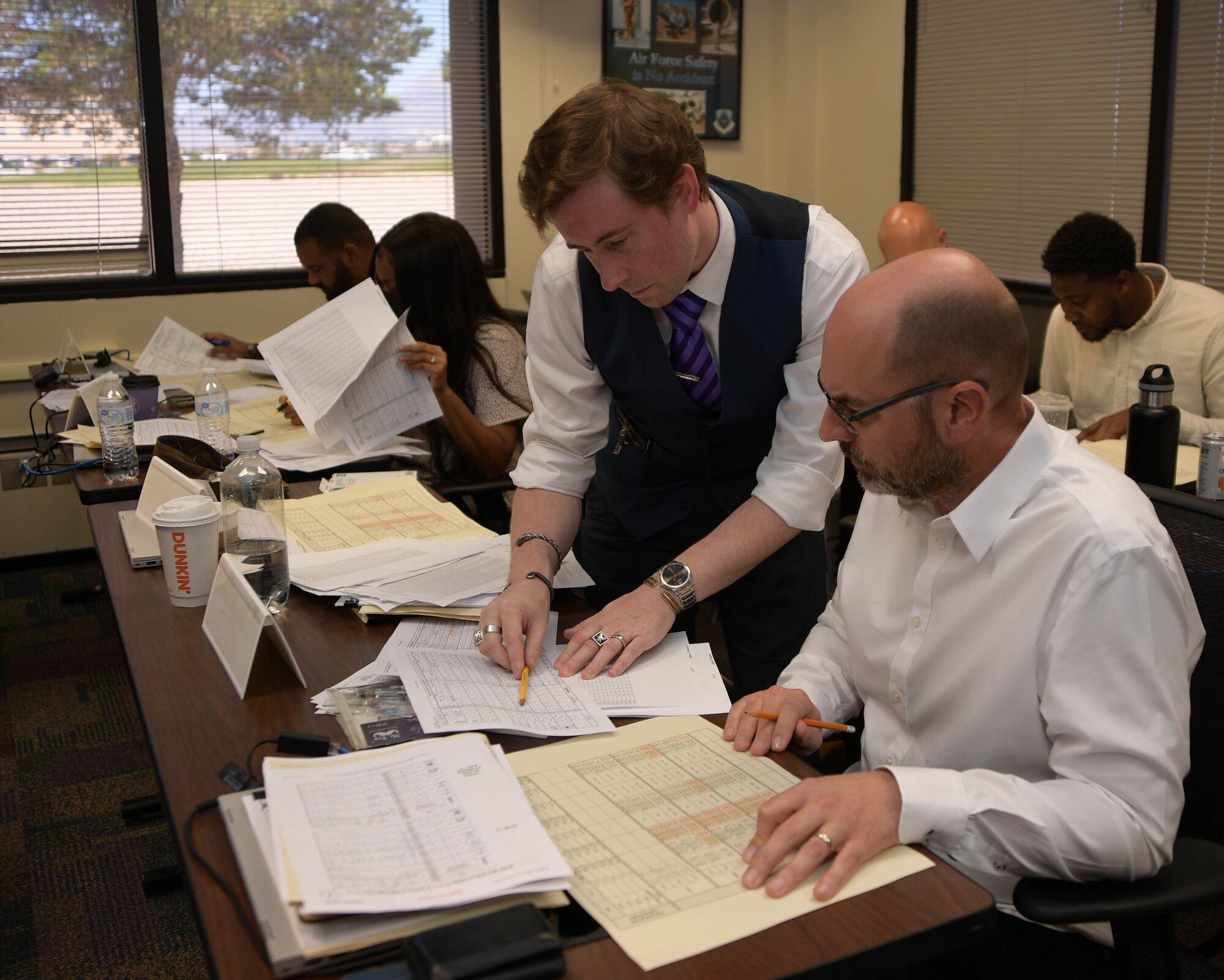 Students of the Allied Ammunition Storage and Transport Publication course collaborate during a course application exercise, August 31, 2023. The week-long training focused on NATO standards for safe ammunition storage. (U.S. Air Force Photo by Ashley Palacios)