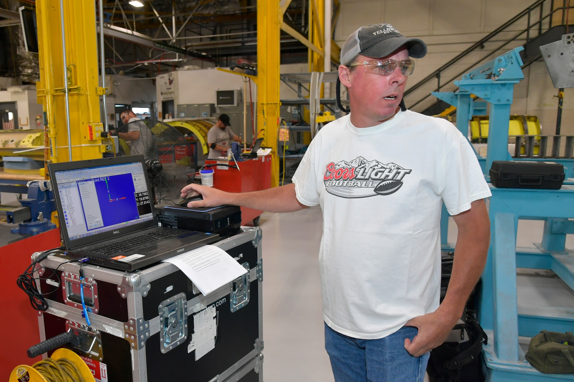 Brian Wilson, Metrology and Calibration Flight dimensional work lead, maps data points to checks tolerances on a jig fixture used for building A-10 fuselage sections July 25, 2023, at Hill Air Force Base, Utah. Machine inspections and calibrations are accomplished on thousands of machines throughout the installation each year by personnel in the 809th Maintenance Support Squadron. (U.S. Air Force photo by Todd Cromar)