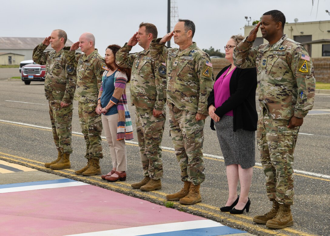 Combined Force Space Component Command leadership and Space Launch Delta 30 leadership salute U.S. Space Force Gen. Chance Saltzman, Chief of Space Operations, during his departure from the flight line at Vandenberg Space Force Base, California on Aug. 23, 2023.