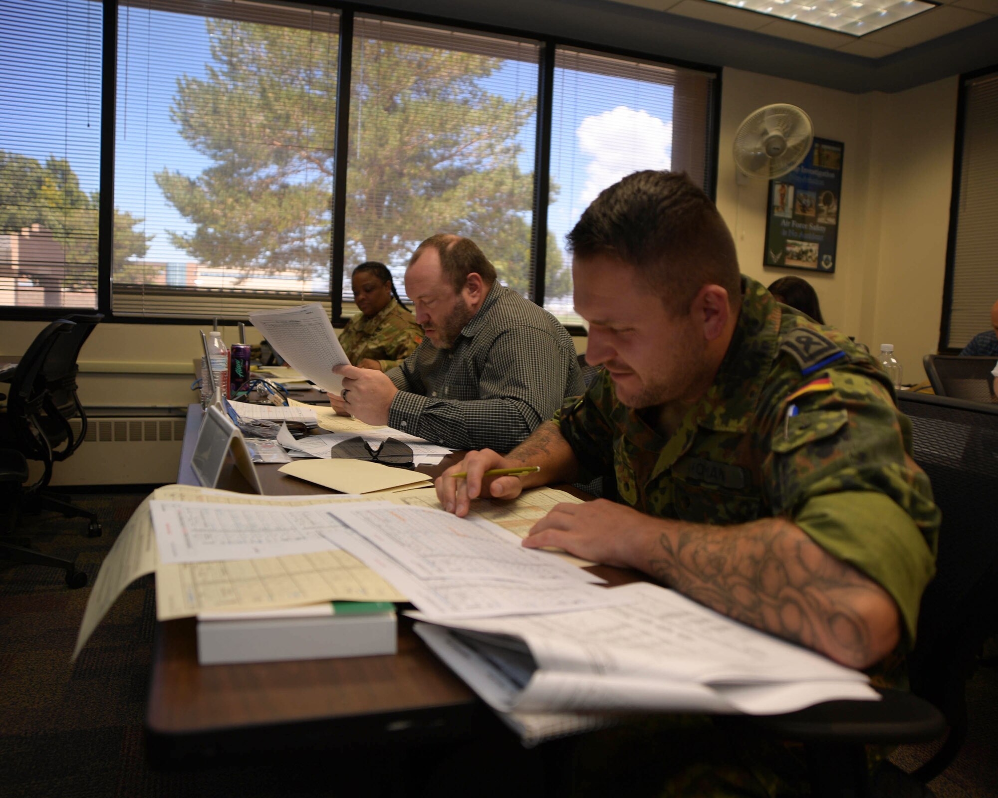 A German student of the Allied Ammunition Storage and Transport Publication course works on a course application exercise, August 31, 2023. The week-long training focused on NATO standards for safe ammunition storage. (U.S. Air Force Photo by Ashley Palacios)