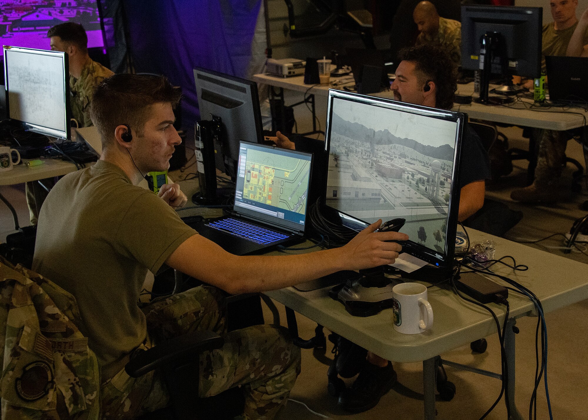 U.S. Air Force Senior Airman Owen Worth, 316th Civil Engineer Squadron firefighter, operates the Advanced Disaster Management Simulator at Joint Base Andrews, Md., Aug. 29, 2023.