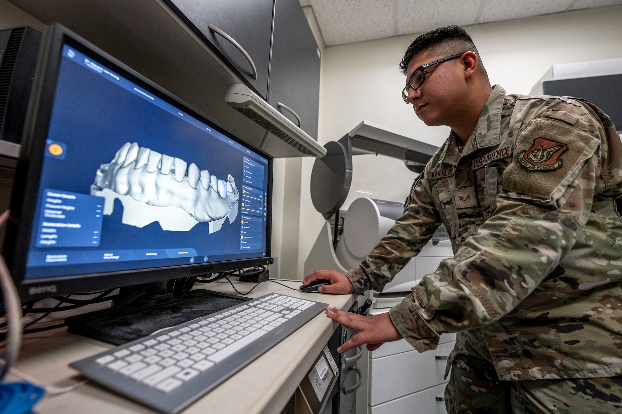 U.S. Air Force Senior Airman Tristan Karalash, 51st Operational Medical Readiness Squadron dental flight lab technician, takes a 3-D scan of a dental mold at Osan Air Base, Republic of Korea, Sep. 6, 2023.
