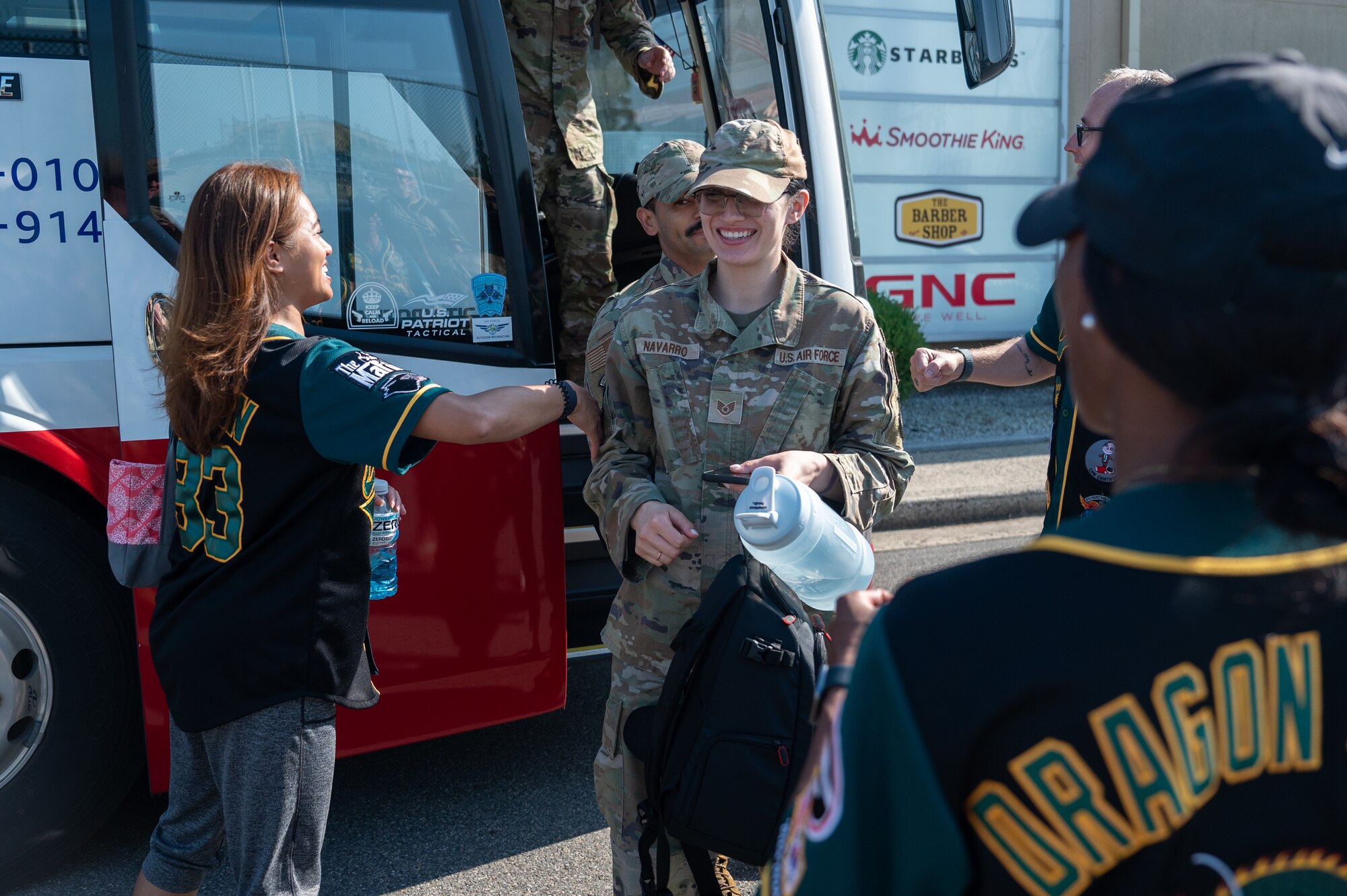 Lt. Col. May Euavijitearoon welcomes Staff Sgt. Ariel Navarro and others upon their return to Kunsan Air Base after the completion of Operation Pack Up.