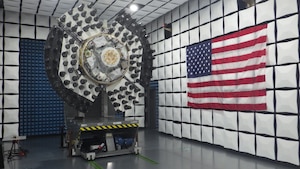 The Navigation Technology Satellite-3, or NTS-3, spacecraft is shown in an anechoic test chamber prior to electromagnetic interference and electromagnetic compatibility testing in Palm Bay, Florida. This experimental satellite is being designed, built and tested by L3Harris Technologies, and will be used by the Air Force Research Laboratory and partner organizations as part of an integrated system to conduct a one-year demonstration of advanced technologies and concepts in satellite navigation. The NTS-3 launch is anticipated in mid-2024 from Cape Canaveral Space Force Station, Florida on the first U.S. Government flight of the new United Launch Alliance Vulcan rocket. (Courtesy photo)