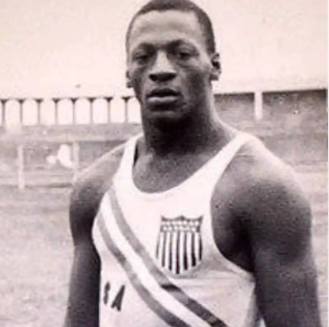 Vintage photo of Peacock in Olympic gear prior to the injury that prevented his participation in the 1936 Olympics. (Courtesy of the Union Historical Society)