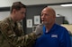 U.S. Air Force Airman 1st Class Zachary Riggins, 5th Operations Support Squadron aircrew flight equipment (AFE) technician, sizes flight equipment for the Honorable Tom Ross, mayor of Minot, North Dakota, at Minot Air Force Base, North Dakota, Sept. 5, 2023. The AFE technicians take thorough measurements to ensure the flight equipment functions safely. (U.S. Air Force photo by Senior Airman Zachary