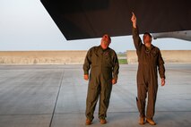 U.S. Air Force Col. Dan Hoadley, 5th Bomb Wing commander, conducts pre-flight checks on the wing of a B-52H Stratofortress with The Honorable Tom Ross, Mayor of Minot, North Dakota, at Minot Air Force Base, North Dakota, Sept. 6, 2023. The wingspan of a B-52H is 185 feet, with a span that long the wings requires outrigger wheels to assist in taxi, take-off and landings. (U.S. Air Force photo by Airman 1st Class Alexander Nottingham)