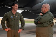 U.S. Air Force Capt. Dylan Collins, 23rd Bomb Squadron weapon systems operator, speaks about the importance of pre-flight checks to the Honorable Tom Ross, mayor of the city of Minot, about the B-52H Stratofortress and its capabilities at Minot Air Force Base, North Dakota, Sept. 6, 2023.  Pre- flight checks ensure that everything on the jet is operational before it takes off. (U.S. Air Force Photo by Airman 1st Class Alexander Nottingham)